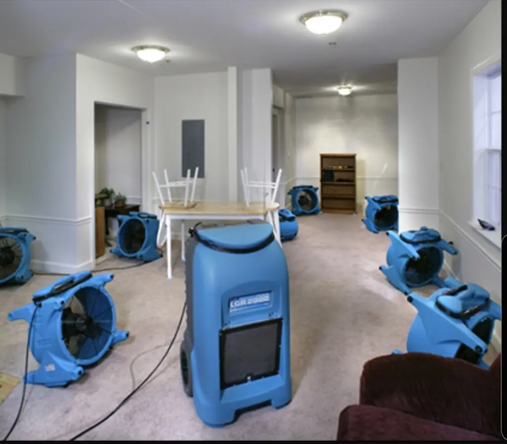Air movers and dehumidifier setup for Water Extraction & Removal in East Manchester