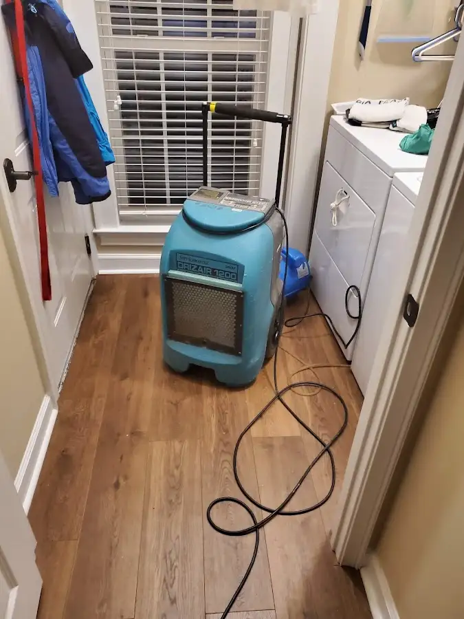 Commercial dehumidifier deployed for Flood Damage Cleanup in East Manchester